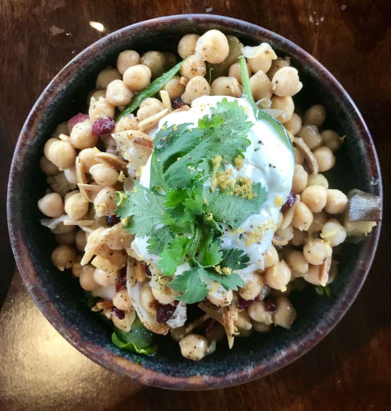 A spiced chickpea bowl with yoghurt and coriander