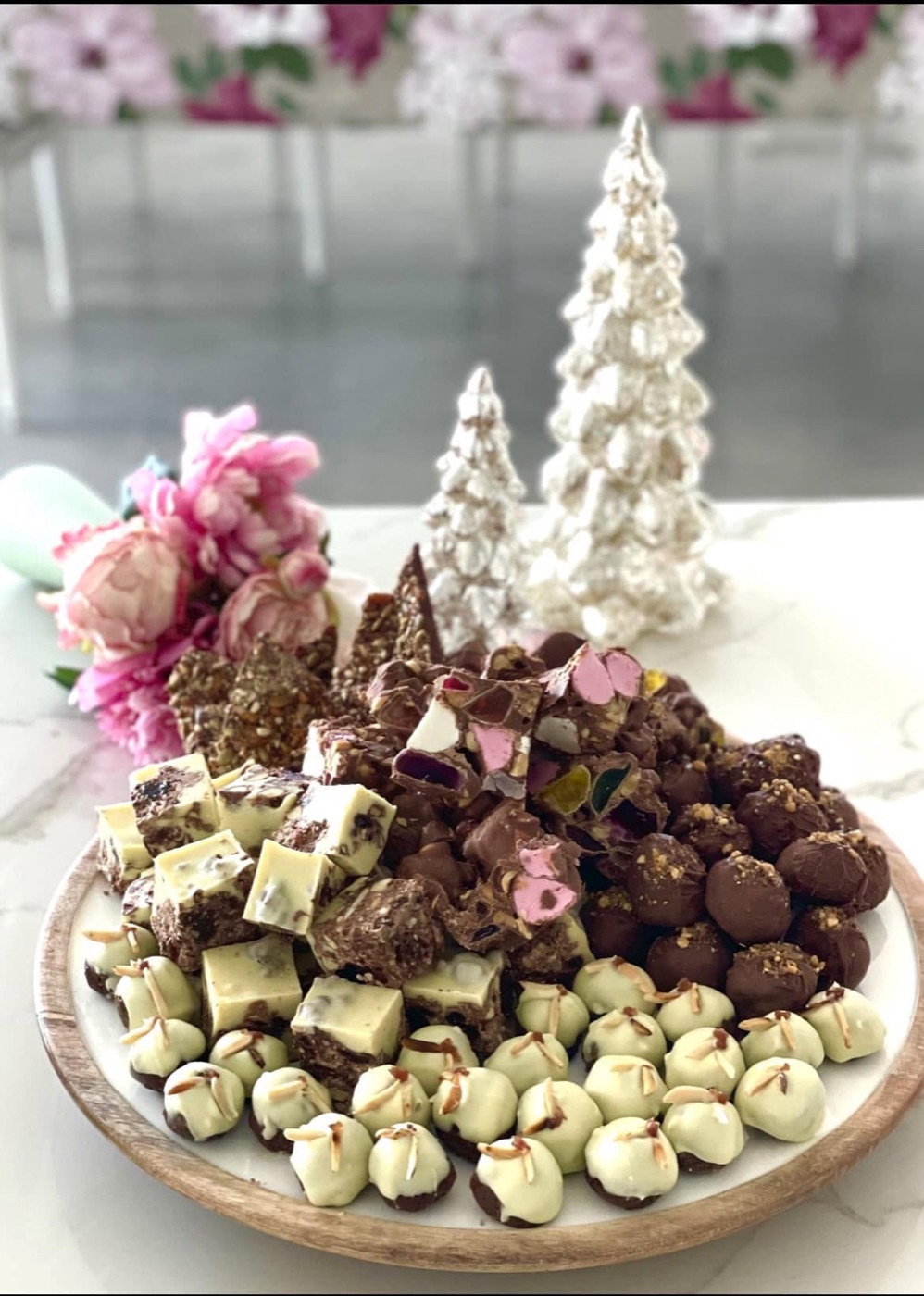 A festive platter piled with rocky road, truffles and almond bonbons