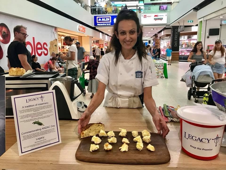 Yvonne sharing rosemary damper at an ANZAC Day fundraiser